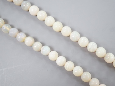 A modern single strand white opal bead necklace, with 585 yellow metal clasp, 44cm.